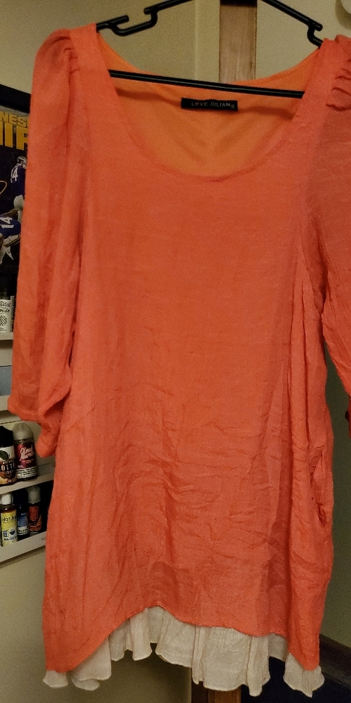 Quarter sleeve dress shirt.